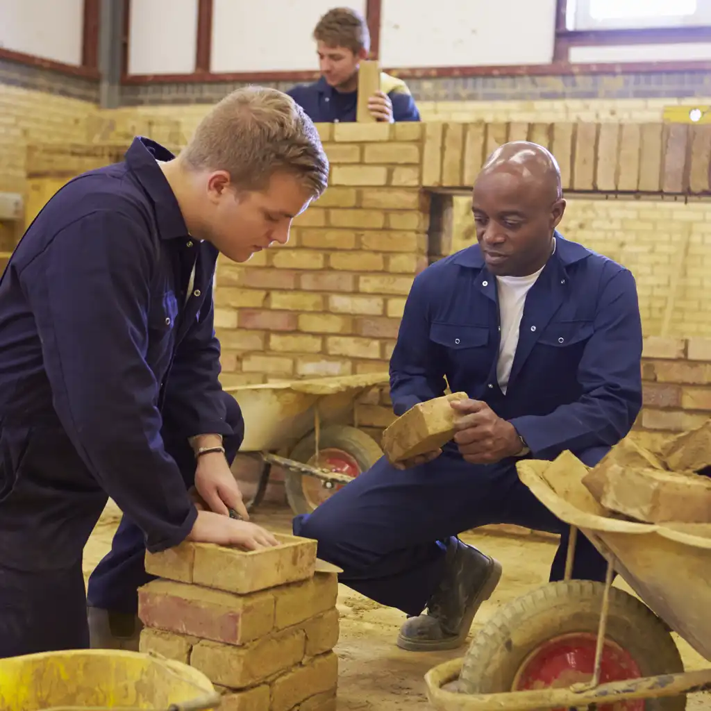 Unlock New Opportunities with a Skills Bootcamp Through ETS - trainees learning to lay bricks